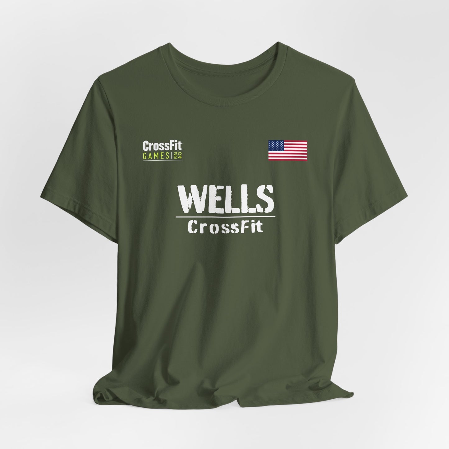 Military Green Brooke Wells CrossFit Games t-shirt featuring the athlete's name and logo in a bold design, perfect for fans and supporters of the CrossFit athlete. A stylish jersey showcasing dedication to the sport.