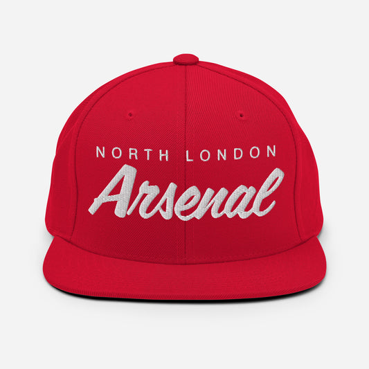 Red Vintage North London Arsenal FC snapback hat featuring a retro design with the club's name embroidered on the front of a flat bill cap with and an adjustable strap, showcasing official fan gear for Arsenal supporters