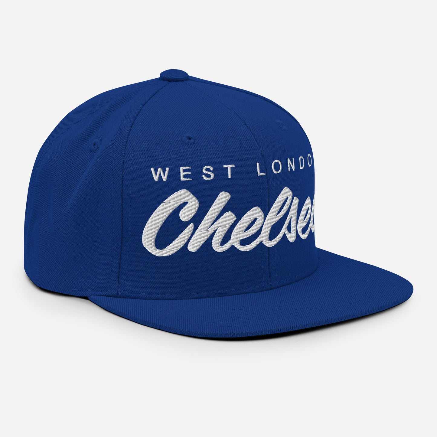 Right side of Blue vintage West London Chelsea FC snapback hat featuring a retro design with the club's name embroidered on the front of a flat bill cap, complete with an adjustable strap, showcasing official fan gear for Chelsea supporters